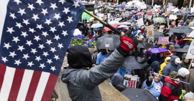 People march along 42nd Street during a protest against Donald Trump and his administration&#039;s policies, New York, U.S., April 5, 2025. (EPA Photo)