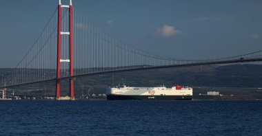 BYD&#039;s vehicle carrier BYD CHANGZHOU is photographed below the iconic 1915 Çanakkale Bridge as it arrives in Türkiye, April 5, 2025. (AA Photo)