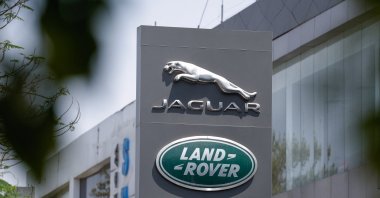 Jaguar and Land Rover, the British vehicle-brand logos of Indian-owned Tata Motors, are displayed in front of a showroom, New Delhi, India, April 2, 2025. (Reuters Photo)