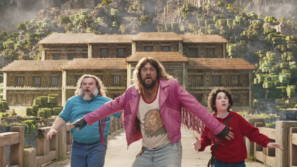 This image released by Warner Bros. Pictures shows (from L) Jack Black, Jason Momoa and Sebastian Hansen in a scene from &quot;A Minecraft Movie.&quot; (AP Photo)