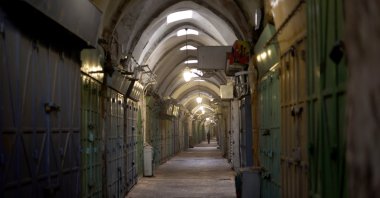 A Palestinian man walks in the alleys of the old city of Jerusalem during a general strike in the Palestinian territories in solidarity with Gaza, East Jerusalem, occupied Palestine. April 7, 2025. (EPA Photo)