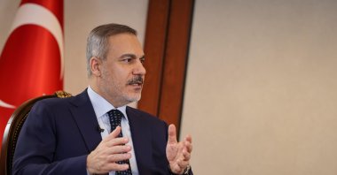 Foreign Minister Hakan Fidan speaks during an interview with Iraqi TV in this screenshot taken on April 7, 2025. (DHA Photo)