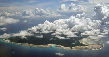 Clouds hang over the North Sentinel Island, in India&#039;s southeastern Andaman and Nicobar Islands, Nov. 14, 2005. (AP Photo)
