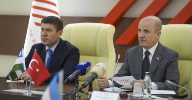 Erol Özvar (R), the president of Türkiye’s Council of Higher Education (YÖK), and Odil Abdurakhmanov, head of the Social Development Department of the Presidency of Uzbekistan, at a meeting, Ankara, Türkiye, April 7, 2025. (AA Photo)