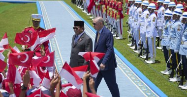 Indonesian President Prabowo Subianto (L) walks with President Recep Tayyip Erdoğan as they inspect the honor guard during a welcoming ceremony prior to their meeting at Bogor Presidential Palace, Bogor, West Java, Indonesia, Feb. 12, 2025. (AP Photo)