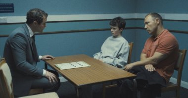 This image released by Netflix shows Mark Stanley, from left, Owen Cooper and Stephen Graham in a scene from &quot;Adolescence.&quot; (AP Photo)