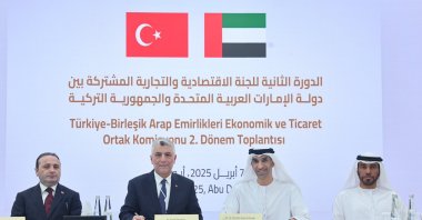 Trade Minister Ömer Bolat (2-L) and Thani Ahmed Al Zeyoudi, the UAE minister of state for foreign trade, pose during the second session of the Joint Economic and Trade Commission (JETCO), Abu Dhabi, UAE, April 7, 2025. (DHA Photo)