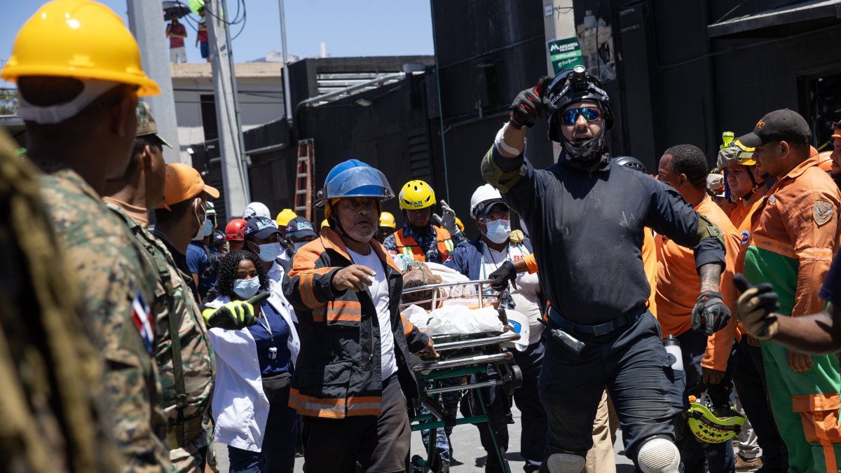 Emergency workers evacuate an injured person at the scene after the collapse of the Jet Set Club&#039;s roof in Santo Domingo, Dominican Republic, April 8, 2025. (EPA Photo)
