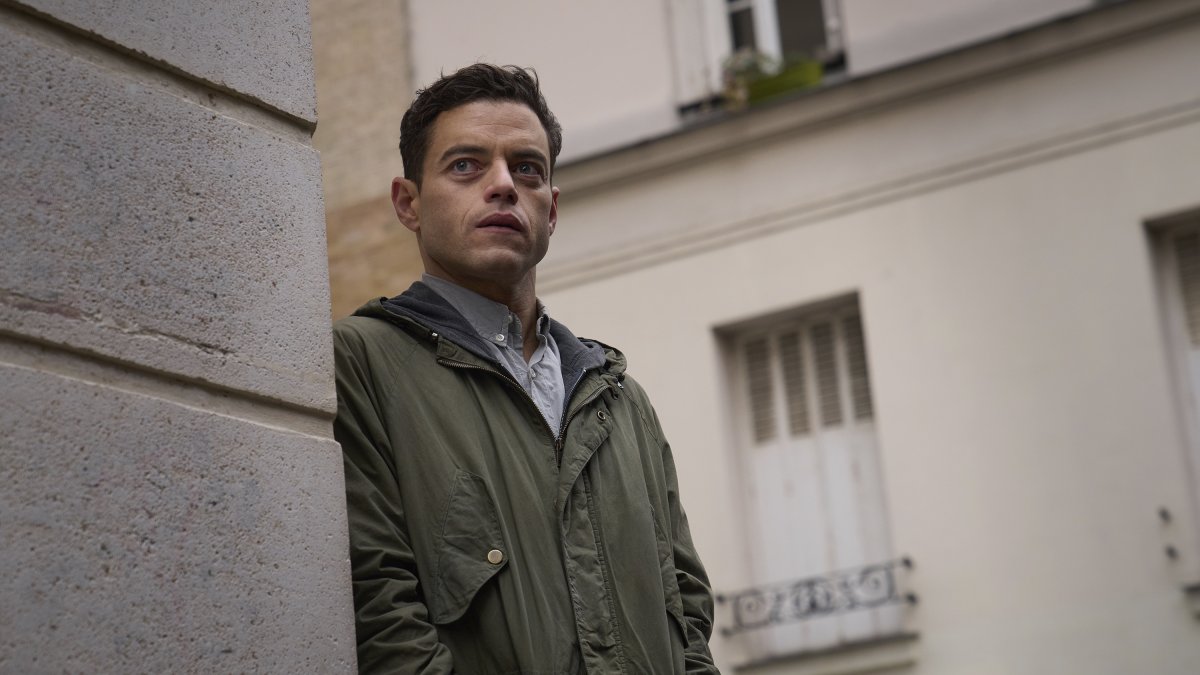 This image released by 20th Century Studios shows Rami Malek in a scene from &quot;The Amateur.&quot;  (AP Photo)