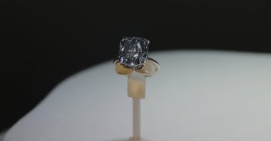 The Mediterranean Blue diamond is on display during its worldwide debut in Abu Dhabi, UAE, April 8, 2025. (AP Photo)