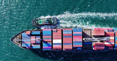 A container ship sails it approaches a port in Qingdao, Shandong province, China, April 2, 2025. (AFP Photo)