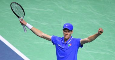 Italy&#039;s Jannik Sinner celebrates his victory over Netherlands&#039; Tallon Griekspoor during their final singles tennis match between Italy and Netherlands at the Davis Cup Finals, Malaga, Spain, Nov. 24, 2024. (AFP Photo)