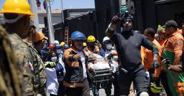 Emergency workers evacuate an injured person at the scene after the collapse of the Jet Set Club's roof in Santo Domingo, Dominican Republic, April 8, 2025. (EPA Photo)