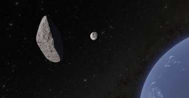 This artistic animation shows asteroid 2024 YR4 passing by Earth. Astronomers created a 3D image of the newly discovered asteroid after observing it with a telescope in Chile. (AP Photo)