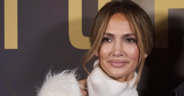 American singer Jennifer Lopez poses for photographers upon arrival at the premiere of the film "Unstoppable," London, U.K., Nov. 5, 2024. (AP Photo)
