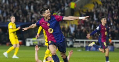 Barcelona&#039;s striker Robert Lewandowski celebrates after scoring the 3-0 goal during the UEFA Champions League quarterfinal first leg match against Borussia Dortmund at the Estadio Olimpico Lluis Companys, Barcelona, Spain, April 9, 2025. (EPA Photo)