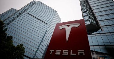 A Tesla logo is seen outside a showroom of the carmaker, Beijing, China, May 31, 2023. (Reuters Photo)