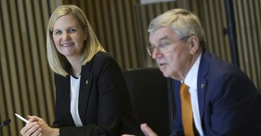 International Olympic Committee (IOC) outgoing President Thomas Bach (R) speaks next to the President-elect Kirsty Coventry at the opening of the executive board meeting of the IOC, at the Olympic House, Lausanne, Switzerland, April 9, 2025. (AP Photo)