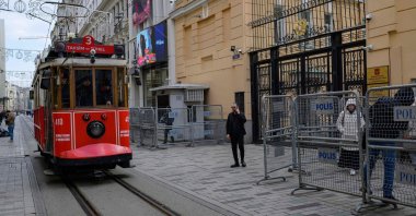 A nostalgic tram passes in front of the Russian Consulate on Istiklal Avenue in Istanbul, Türkiye, April 10, 2025. (AFP Photo)