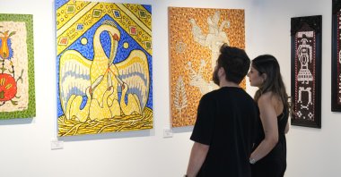 Visitors explore the "Traces of History" exhibition at the 6th Daire Art Gallery, Istanbul, Türkiye, April 9, 2025. (AA Photo)