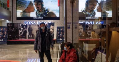 A screen shows a trailer for the movie &quot;Black Panther: Wakanda Forever&quot; by Marvel Studios at a cinema in Beijing, China, Feb. 6, 2023. (Reuters Photo)
