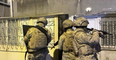 Turkish gendarmerie officers prepare to raid a house hiding five Iraqi nationals linked to the Daesh terrorist group, in central Yozgat province, Türkiye, Dec. 28, 2023. (DHA Photo)