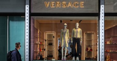 A man walks by a Versace store in New York City, U.S., April 10, 2025. (Reuters Photo)
