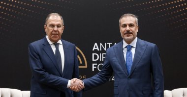 Russian Foreign Minister Sergei Lavrov (L) shakes hands with Turkish Foreign Minister Hakan Fidan during a meeting on the sidelines of the Antalya Diplomacy Forum, in Antalya, Türkiye, April 12, 2025. (Reuters Photo)