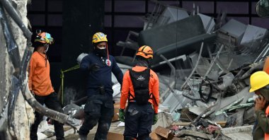 Rescuers work amid debris at the Jet Set nightclub, whose roof collapsed, Santo Domingo, Dominican Republic, April 10, 2025. (AFP Photo)