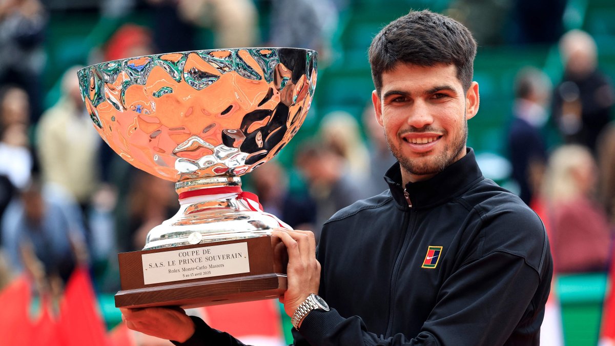Spain&#039;s Carlos Alcaraz celebrates with the Monte Carlo Masters trophy in Roquebrune-Cap-Martin, Monte Carlo, April 13, 2025. (AFP Photo)
