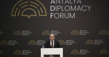 Treasury and Finance Minister Mehmet Şimşek delivers a speech at Antalya Diplomacy Forum (ADF), Antalya, southern Türkiye, March 12, 2025. (AA Photo)