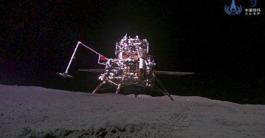 This China National Space Administration (CNSA) handout image released by Xinhua News Agency shows the lander-ascender combination of the Chang&#039;e-6 probe taken by a mini rover after it landed on the moon surface, June 4, 2024. (AP Photo)