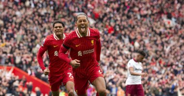Liverpool&#039;s Virgil van Dijk celebrates after scoring the third goal during the English Premier League match against West Ham United, 
Liverpool, U.K., April 13, 2025. (EPA Photo)
