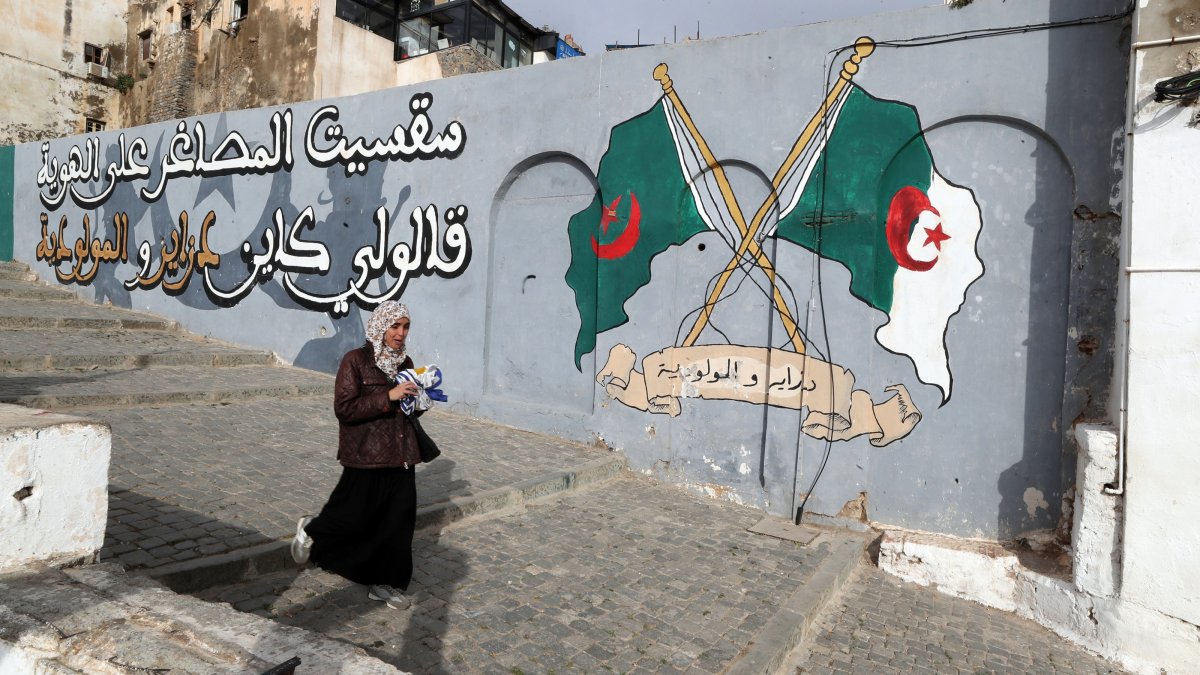 An Algerian woman walks on a street of the old town Casbah in Algiers, Algeria, April 10, 2025. (EPA Photo)