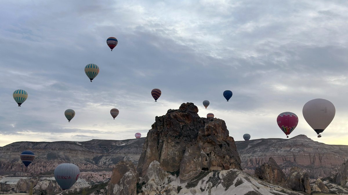 Hot air balloons drift over the unique landscapes of Cappadocia, Türkiye, April 14, 2025. (AA Photo)