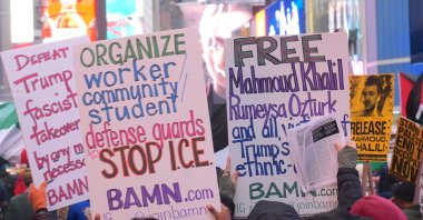 Demonstrators take part in a rally in support of Mahmoud Khalil, Badar Khan Suri, Rümeysa Özturk, Yunseo Chung and other students detained for being pro-Palestine, at Times Square, New York, U.S., April 12, 2025. (AA Photo)