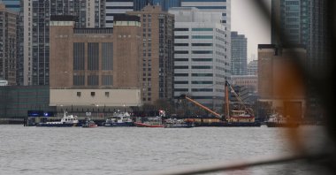 Rescue workers and emergency personnel work at the scene of a helicopter crash on the Hudson River near lower Manhattan, New York, U.S., April 10, 2025. (Reuters Photo)