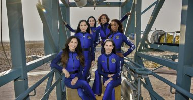 This image provided by Blue Origin shows, first row, seated, from left: Lauren Sanchez and Kerianne Flynn and standing in back from left: Amanda Nguyen, Katy Perry, Gayle King and Aisha Bowe in West Texas. (Blue Origin via AP)