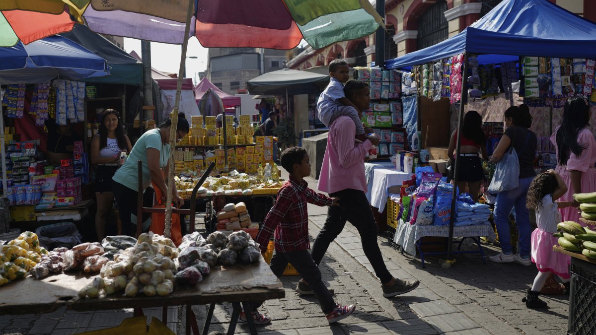 Vendors selling products in a street market, Caracas, Venezuela, April 11, 2025. (AP Photo)
