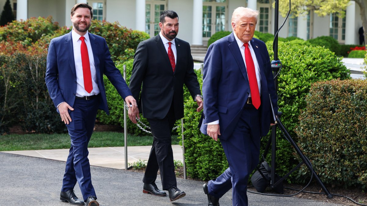 U.S. President Donald Trump and Vice President JD Vance walk with Ohio State coach Ryan Day, as Trump hosts the Ohio State University 2025 College Football National Champions, at the White House, Washington, U.S., April 14, 2025. (Reuters Photo)