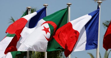 French and Algerian flags are seen in Algiers, Algeria, Aug. 25, 2022. (AFP File Photo)