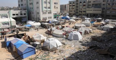 A partial view shows tents housing displaced Palestinians on the campus of the Islamic University in Gaza City, April 16, 2025. (AFP Photo)