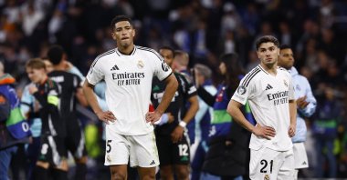 Real Madrid&#039;s Jude Bellingham (L) and Brahim Diaz look dejected after the UEFA Champions League quarterfinal second leg match against Arsenal at the Bernabeu, Madrid, Spain - April 16, 2025. (Reuters Phtoo)