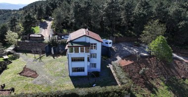 Drone footage shows the house perched on the peak of the mountain, Yalova, Türkiye, April 11, 2025. (AA Photo)