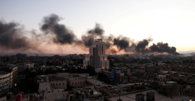 Smoke rises, after Syrian anti-regime forces announced that they have ousted Syria&#039;s Bashar Assad, in Damascus,  Syria, Dec. 8, 2024. (Reuters Photo)