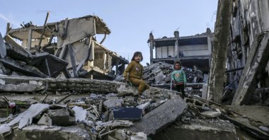 Palestinian children play on the rubble of their destroyed family house in Gaza City, northern Gaza Strip, April 14, 2025. (EPA Photo)