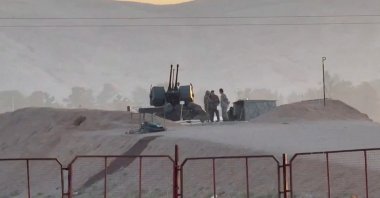 Military personnel stand guard at a nuclear facility in the Zardanjan area of Isfahan, Iran, April 19, 2024, in this screengrab taken from video. (WANA (West Asia News Agency) via Reuters)