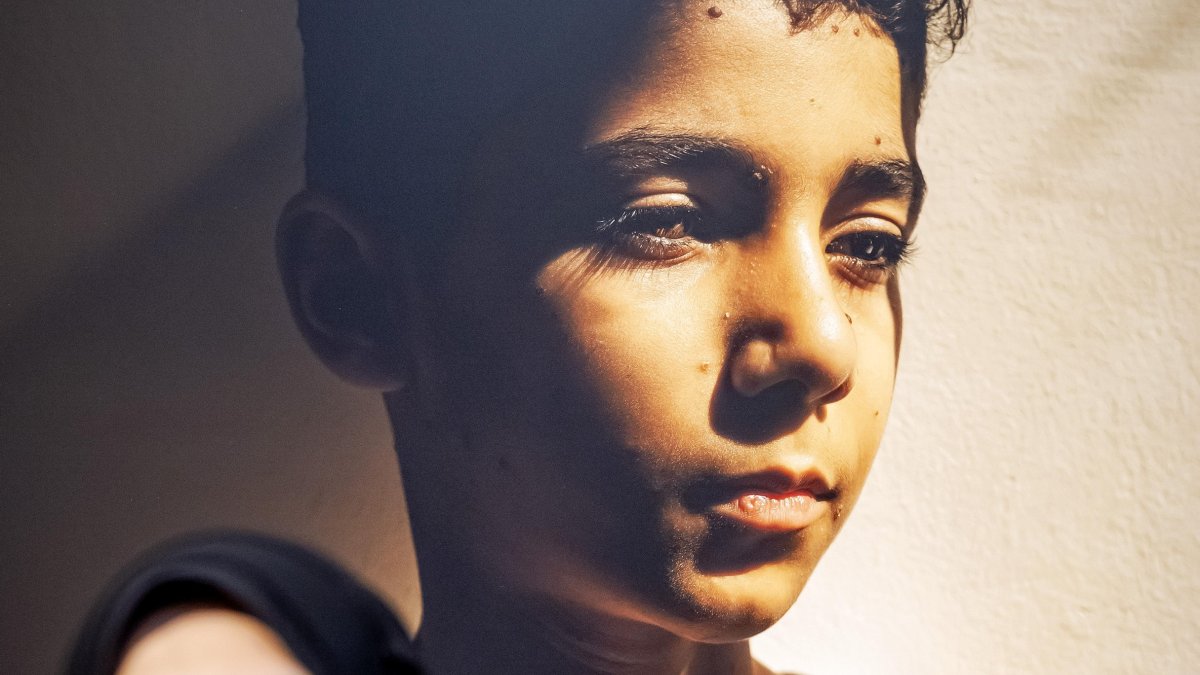 Palestinian photographer Samar Abu Elouf poses before her World Press Photo of the Year-winning photograph, during the announcement of the World Press Photo winners at the Nieuwe Kerk, Amsterdam, Netherlands, April 17, 2025. (EPA Photo)