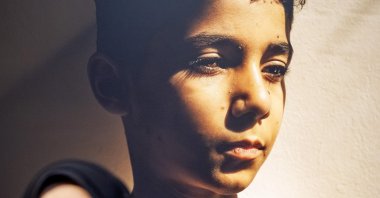 Palestinian photographer Samar Abu Elouf poses before her World Press Photo of the Year-winning photograph, during the announcement of the World Press Photo winners at the Nieuwe Kerk, Amsterdam, Netherlands, April 17, 2025. (EPA Photo)