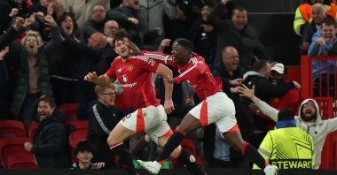 Manchester United&#039;s Harry Maguire (L) celebrates after scoring during the Europa League quarterfinal second leg match against Olympique Lyonnais, Old Trafford, Manchester, U.K., April 17, 2025. (Reuters Photo)